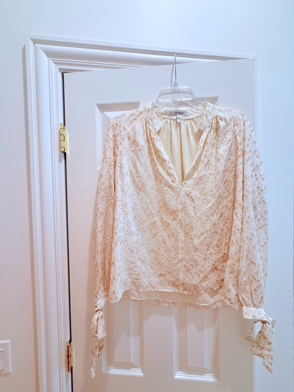 Cream and Gold abstract V-Neck Tie-Cuff Blouse. It's lined